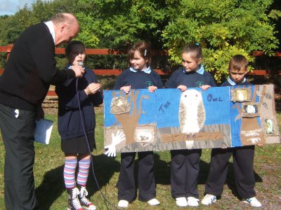 Pupils from St.Brendan's NS, Rathcoole, Co Cork (one of Kerry diocese's Cork parishes!) displaying the Owl project of Sophie Cotter. They are pictured with local PP Fr Liam Comer. 
