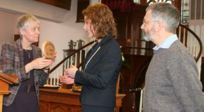 Catherine Brennan SSL, ECI chairperson, presents an ECI award to Kilbride Presbyterian Minister, Rev Karen Campbell, and Bertie Stirling